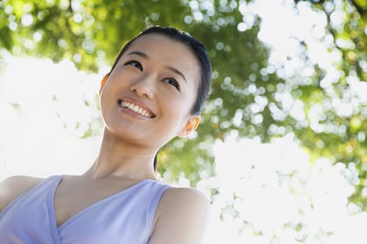 Portrait of Young Woman In Park