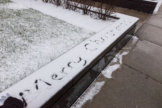 Snow on Christmas day in Chicago near Lake Michigan shore.