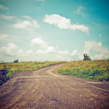 Landscape of the road to the hill with retro filter effect