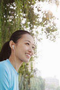 Young Woman Listening to Music