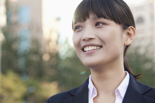 Young Businesswoman  Looking away