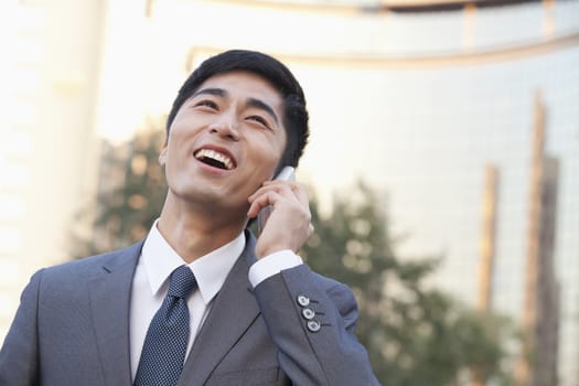 Young Businessman Talking on Cell phone