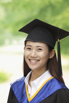 Young Woman Graduating From University, Close-Up Vertical Portrait