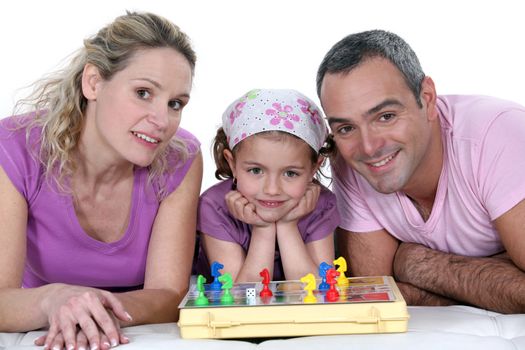 Little girl playing chess