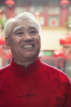 Portrait of senior man in Chinese traditional clothing