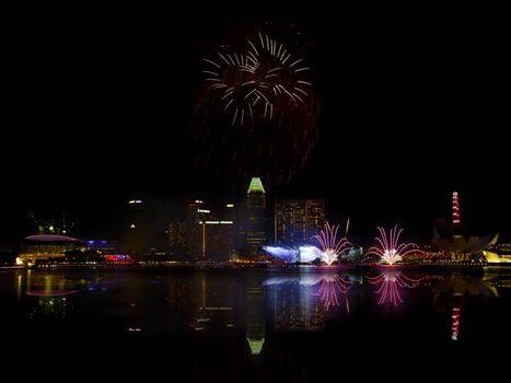 Fireworks over Marina bay in Singapore on National day