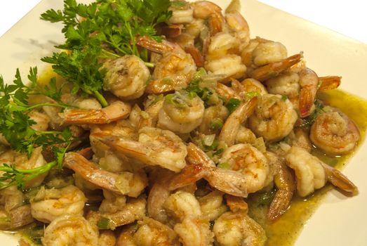Shrimps cooked with ginger and garlic, steamed with white wine