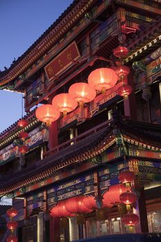 Traditional Chinese building illuminated at night in Beijing, China