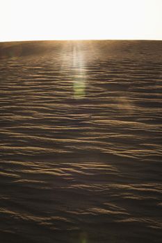 Sun coming down over a sand dune, no people, landscape, 