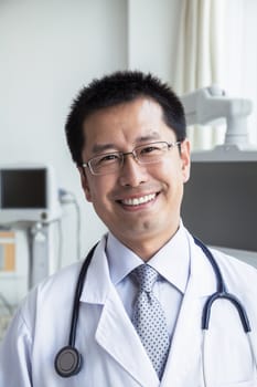 Portrait of smiling doctor with a stethoscope looking at camera