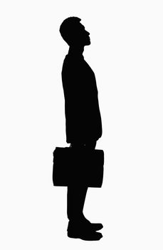Silhouette of businessman with briefcase.