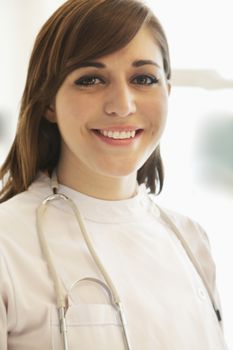 Portrait of smiling young female doctor in a hospital 