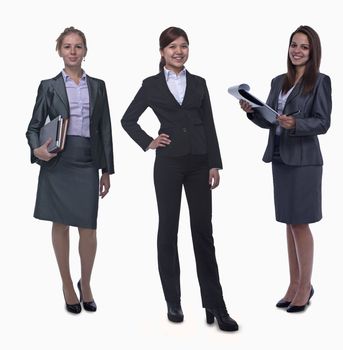 Portrait of three young smiling businesswomen, looking at camera, studio shot