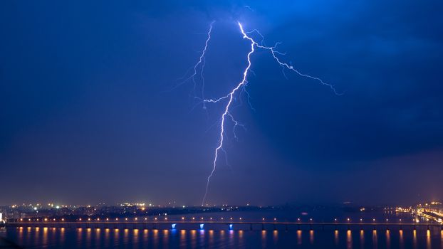 View of a lightning over city at night