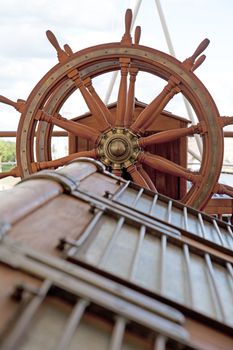 Rudder with settle in background on a yacht 