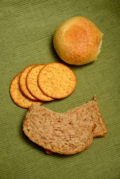 an assortment of breads, crackers and rolls for carb concept