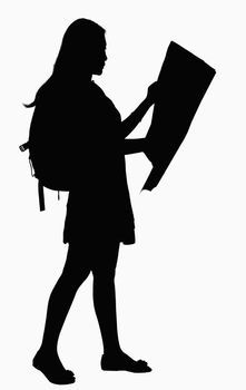 Silhouette of woman looking at map.