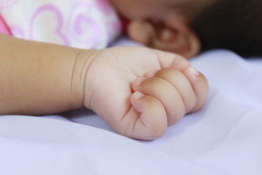 Closeup little hand of baby in sleep time