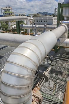 Steel pipe line with blue sky in sunny day