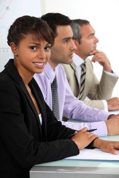 Three people sat on interview panel