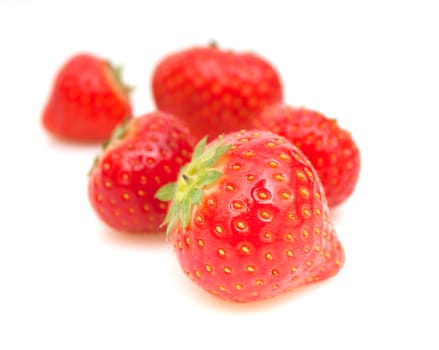 Fresh Red Strawberries on White Background - Shallow Depth of Field