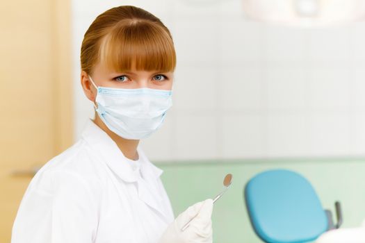 A portrait of a dental worker, dentist or assistant