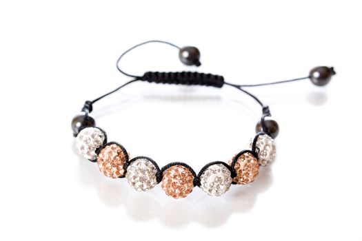 Popular Buddhist bracelet shamballa on a white background.