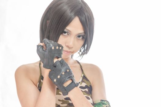 Asian female in army clothing on isolated white background