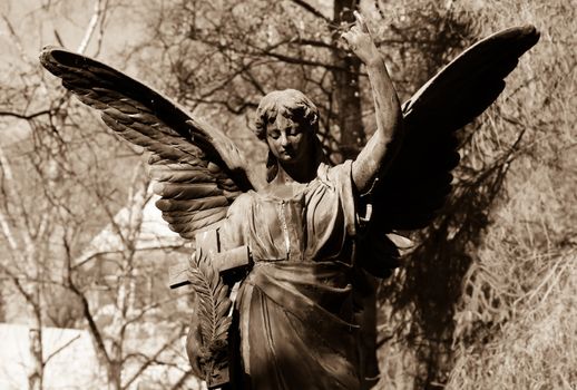Old Angel statue in sepia