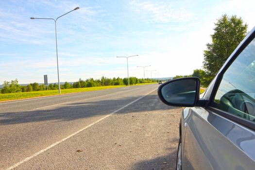 Car standing near the highway road