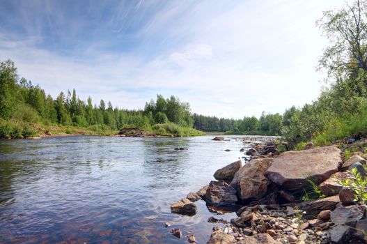 Landscape with forest, river and stones