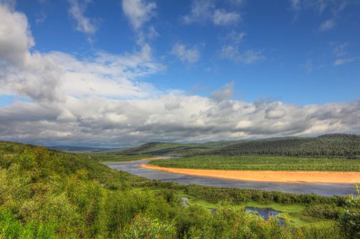 Panoramic view on landscape with river and forest