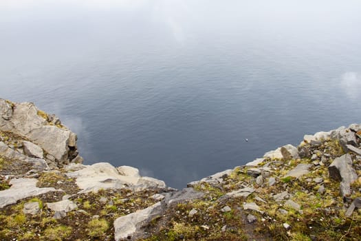 View from Nordkapp with mountain and mist