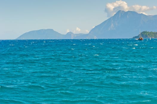 beautiful seascape with mountains in the background