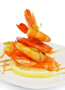 Delicious Fried Shrimps Decorated with Lemon, Mustard Sauce and Thyme closeup on White plate