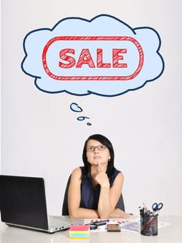 thinking businesswoman in office dreaming on sale