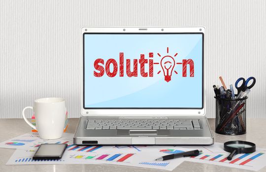 solution symbol on screen laptop in office