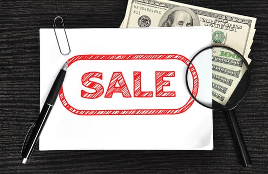 poster with sale symbol and money in the office