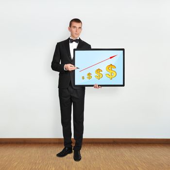 businessman in room holding plasma with dollar up