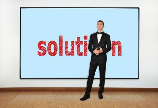 businessman in office and big plasma with solution