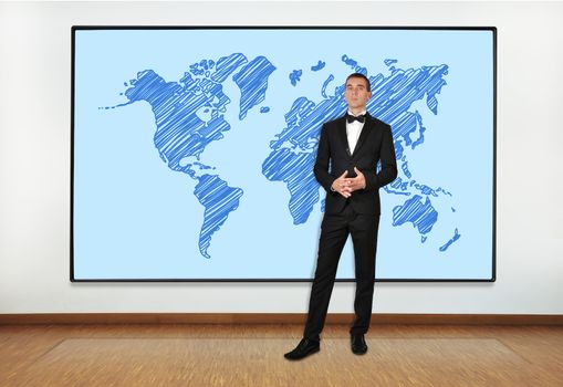 businessman in office and big plasma with world map