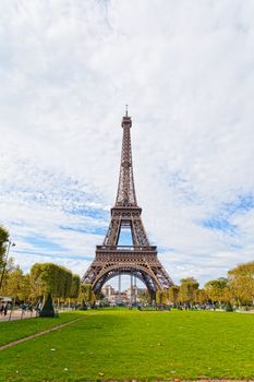 Eiffel Tower against the blue sky and clouds. Paris. France.