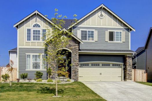 Typical American midclass new development house exterior.