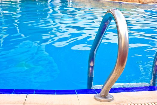Luxury Resort Swimming Pool
high angle on curved edge of a luxury resort swimming pool