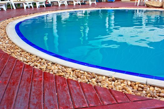 Luxury Resort Swimming Pool
high angle on curved edge of a luxury resort swimming pool