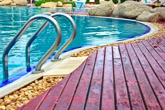 Luxury Resort Swimming Pool
high angle on curved edge of a luxury resort swimming pool