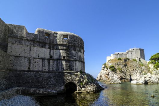 Dubrovnik defensive wall with fortress in the background, Croatia, Europe.