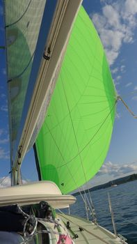 Sailboat with green sail