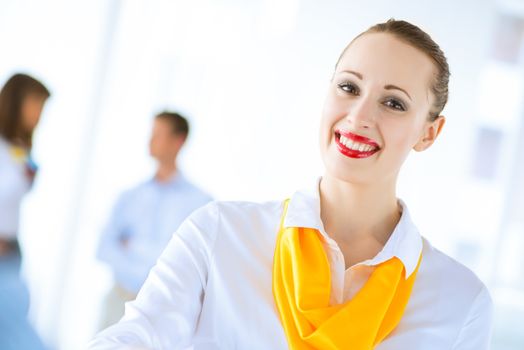 Business woman shaking hands and smiling colleague