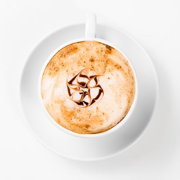 large cup of coffee with pattern on the foam